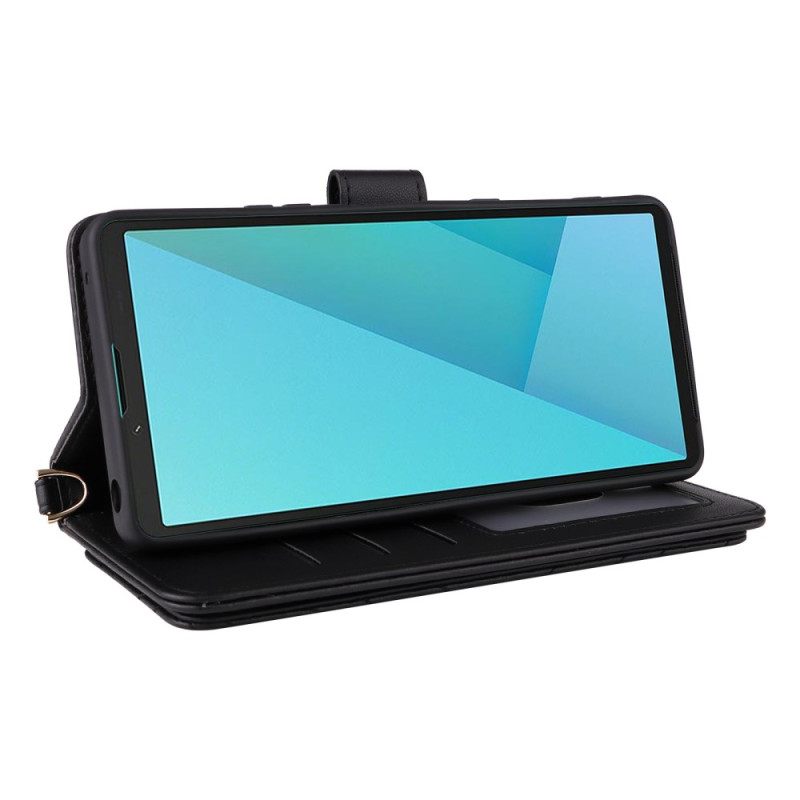 Folio-hoesje Sony Xperia 10 Vii Gewatteerd Met Riempje En Polsbandje